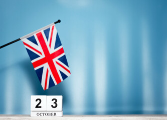 Wall Mural - October Calendar With British Flag With Number  23. Calendar cubes with numbers. Space copy.