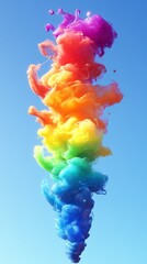 Aufkleber - A swirling, colorful explosion of ink creates a stunning rainbow cloud against a bright blue sky, showcasing vibrant hues merging beautifully in a dynamic display of creativity and artistry