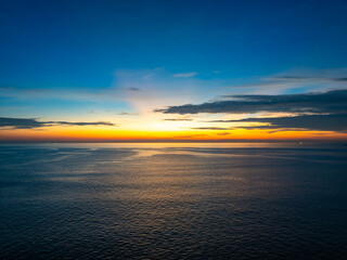 Wall Mural - Aerial view sunset or sunrise sky,Nature beautiful Light Sunset over sea, Colorful scenery Sky with Amazing clouds and waves in sunset sky nature light cloud background
