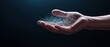 © Riya - hand holding glittering particles