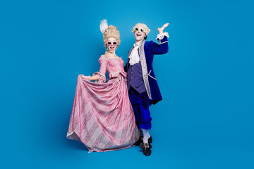 Wall Mural - Delightful couple in baroque attire embracing elegance and humor, showcasing a blend of historical fashion and contemporary style