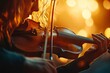 © Gatherina - Passionate violinist playing in warm golden light
