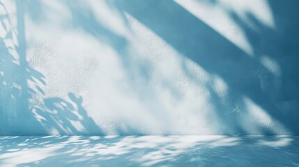 Poster - soft blue wall with gentle shadows creating a calm and serene background for photography and design 