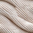 © Sengphachanh25 - Textured Beige Fabric with Soft Vertical Ridges and Waves
