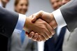 © mohdfaizal - Business Partners Shaking Hands in Professional Atmosphere