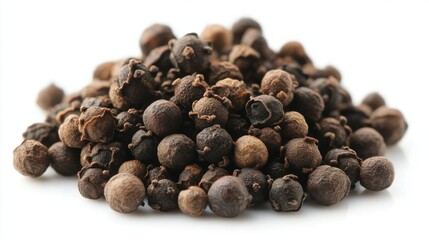 Wall Mural - Black Pepper Seeds Pile on a White Background for Culinary Use