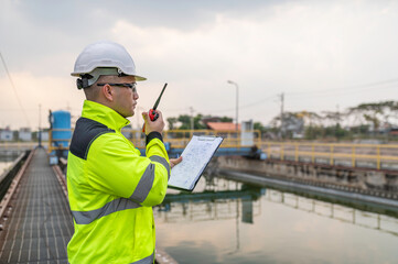 Wall Mural - Environmental engineers work at wastewater treatment plants,Water supply engineering working at Water recycling plant for reuse