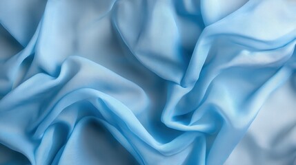 Poster - An intricate close-up of crumpled light blue fabric, illustrating the complex interplay of light and shadow across its delicate fibers, evoking a sense of depth.