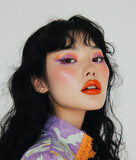 Beautiful young Asian woman with bright colorful make-up