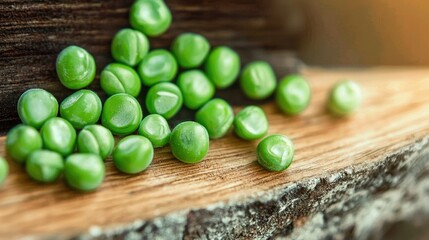 Wall Mural -   A green-pea tower on a wooden table surrounded by piles of green peas