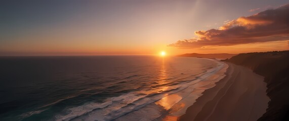 Wall Mural - A stunning view of a coastal sunset with the sun dipping below the horizon while its radiant colors light up the sky and ocean
