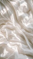 Aufkleber - Soft rays of morning light cast a peaceful glow over a slightly disheveled bed adorned with white sheets, inviting a sense of calm and tranquility. The gentle shadows enhance the fabric's texture