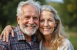 © Maryna - Senior couple embracing outdoors. Smiling happily. Outdoor gathering at home. Portrait style. Closeup. Showing love, connection. Summer day. Family celebration. Relaxed expressions. Older couple