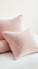 Poster - Unit showcases a luxurious light pink bed linen set featuring plush pillows and a stylish duvet cover. The soft texture adds warmth and comfort to any tranquil bedroom setting