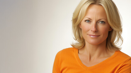 Wall Mural - A cheerful blond businesswoman standing confidently with a smile, radiating positivity and professionalism against a pure white backdrop.