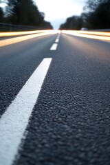 Poster - dramatic perspective of empty road illuminated by vehicle lights : generative ai