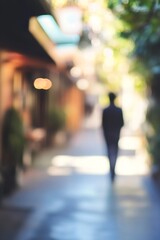 Aufkleber - Blurred figure walking down a picturesque alley with soft sunlight filtering through trees : Generative AI