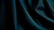© Jantov - Textura de tela de terciopelo verde esmeralda. La imagen muestra un primer plano de la tela con pliegues y sombras, ideal para proyectos de diseño de interiores, moda y texturas. Imagen generada