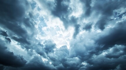 Poster - Dramatic cloudy sky with varying shades of gray and a hint of light peeking through for atmospheric backgrounds : Generative AI