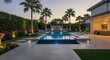 © ryandi - Elegant swimming pool with waterfall and palm trees at dusk