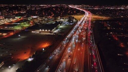 Wall Mural - Nighttime aerial view of highway traffic in Ontario, Canada, showcasing city lights