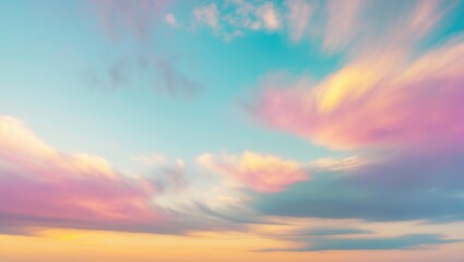 Wall Mural - colorful pastel clouds in a blurred sky at sunrise with soft natural light for dreamy landscape and 