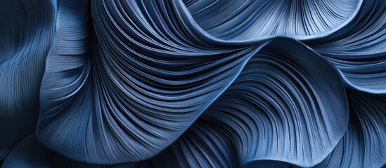 Poster - Blue leather texture with intricate folded pleats and waves creating a sophisticated and elegant visual appeal for design and fashion contexts.