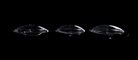 Poster - High-resolution drops of water on a dark backdrop showcasing design elements of freshness and elegance in a minimalist style.