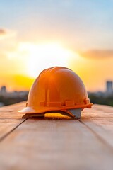 Aufkleber - Sunlit Construction Chronicles Vibrant Orange Helmet on Rustic Table - Industrial Safety Imagery and Project Coordination Visuals for Modern Building Content