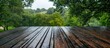 © Cyber Shutter - Rain-soaked wooden rooftop with lush greenery in the background showcasing a tranquil outdoor atmosphere and natural beauty.