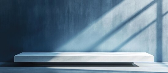 Poster - Blue wall background with podium stand casting deep shadows ideal for product display mockup front view.