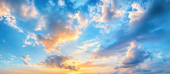 Poster - Stunning sunset sky with dramatic clouds and vibrant colors illuminating the horizon at twilight in a serene landscape.