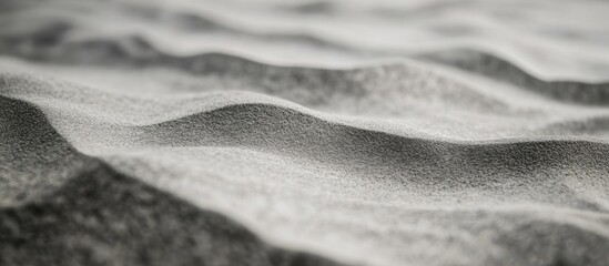 Fototapete - Gray textured background with wavy patterns creating a beautiful abstract landscape ideal for design and artistic projects.