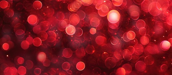 Poster - Vibrant red bokeh abstract background with soft glowing bubbles creating a dreamy and festive atmosphere ideal for creative projects.