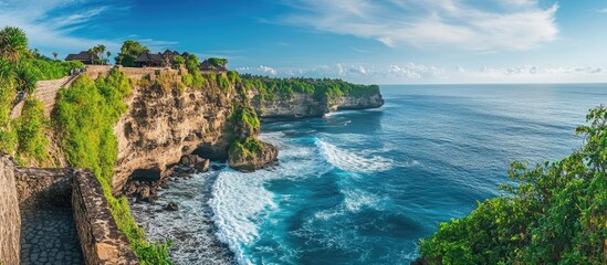 Poster - Coastal Landscape with Stone Cliffs and Serene Ocean Waves Under a Clear Blue Sky