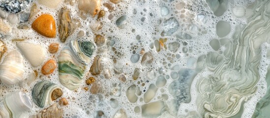 Sticker - Rock Pool Water Texture with Colorful Pebbles and Foamy Bubbles in Natural Coastal Scene