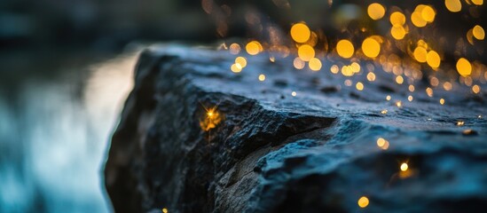 Aufkleber - Glittering rock edge with glowing particles and soft bokeh background creating a magical and enchanting atmosphere
