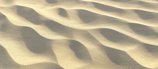 Aufkleber - Sandy beach dunes creating a textured background with gentle waves and patterns in the sand showcasing natural coastal beauty.