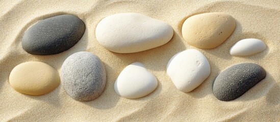 Aufkleber - Sands and Various Shaped Pebbles Beautifully Arranged on Beach Shoreline for Natural Texture and Background