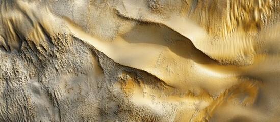 Aufkleber - Textured sand dunes in Vietnam showcasing natural patterns and formations under sunlight creating an abstract landscape view.