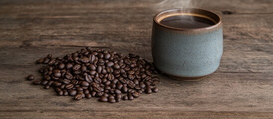 Poster - Roasted coffee beans beside a steaming cup of hot coffee on a rustic wooden surface