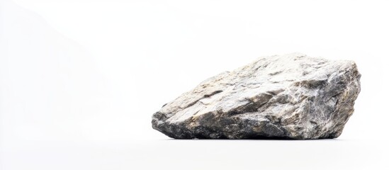 Aufkleber - Minimalist rock stone on white background with ample empty space for text or design elements, ideal for nature-themed projects.