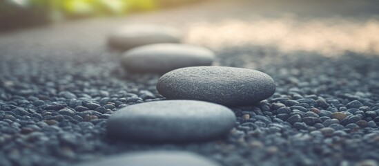Aufkleber - Gravel ground with gray pebbles creating a serene and natural outdoor pathway in soft sunlight.