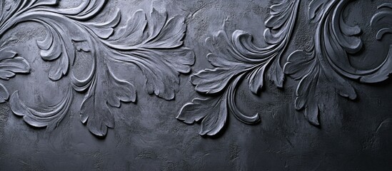 Poster - Gray decorative plaster wall featuring intricate floral patterns and textures for elegant interior design aesthetics.