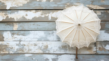 Poster - A charming lace parasol placed against a distressed wooden backdrop
