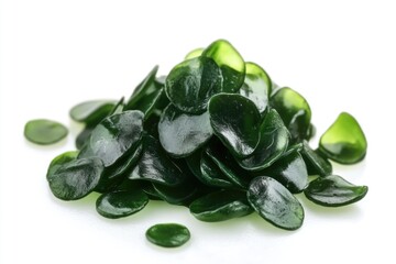 Aufkleber - A pile of fresh green leaves on a clean white surface, great for representing growth or nature