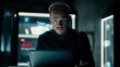 © Coffee Cafe Lover - Intense Man Working on Laptop in Dark, High-Tech Environment