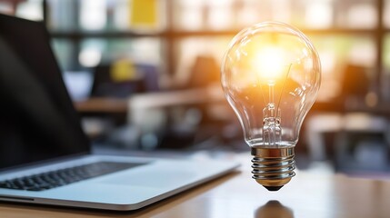 Aufkleber - Innovative Light Bulb Concept with Sunlight Effect Above Laptop in Modern Office : Generative AI