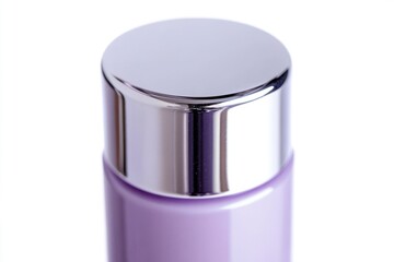 Poster - A close-up view of a bottle of lotion on a white surface, ideal for use in beauty and skincare product advertising or packaging design