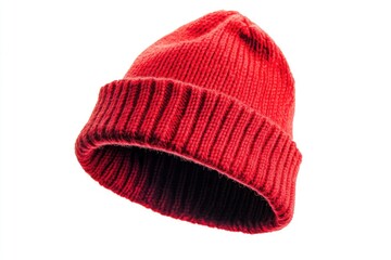 Canvas Print - A bright red knitted hat sits on a clean white background, perfect for use in fashion or textile-related projects